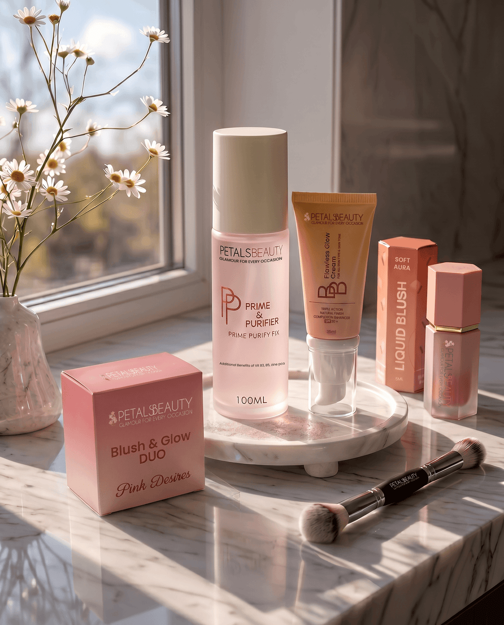 Go and Glow bundle contents laid out with BB cream, primer, blushes and brush