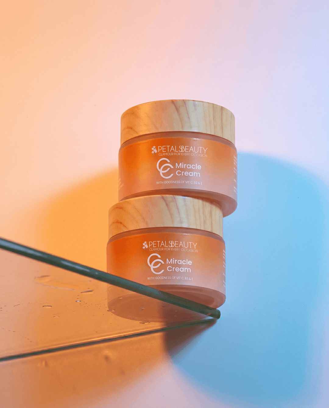 Two jars of Miracle C Cream shown with packaging