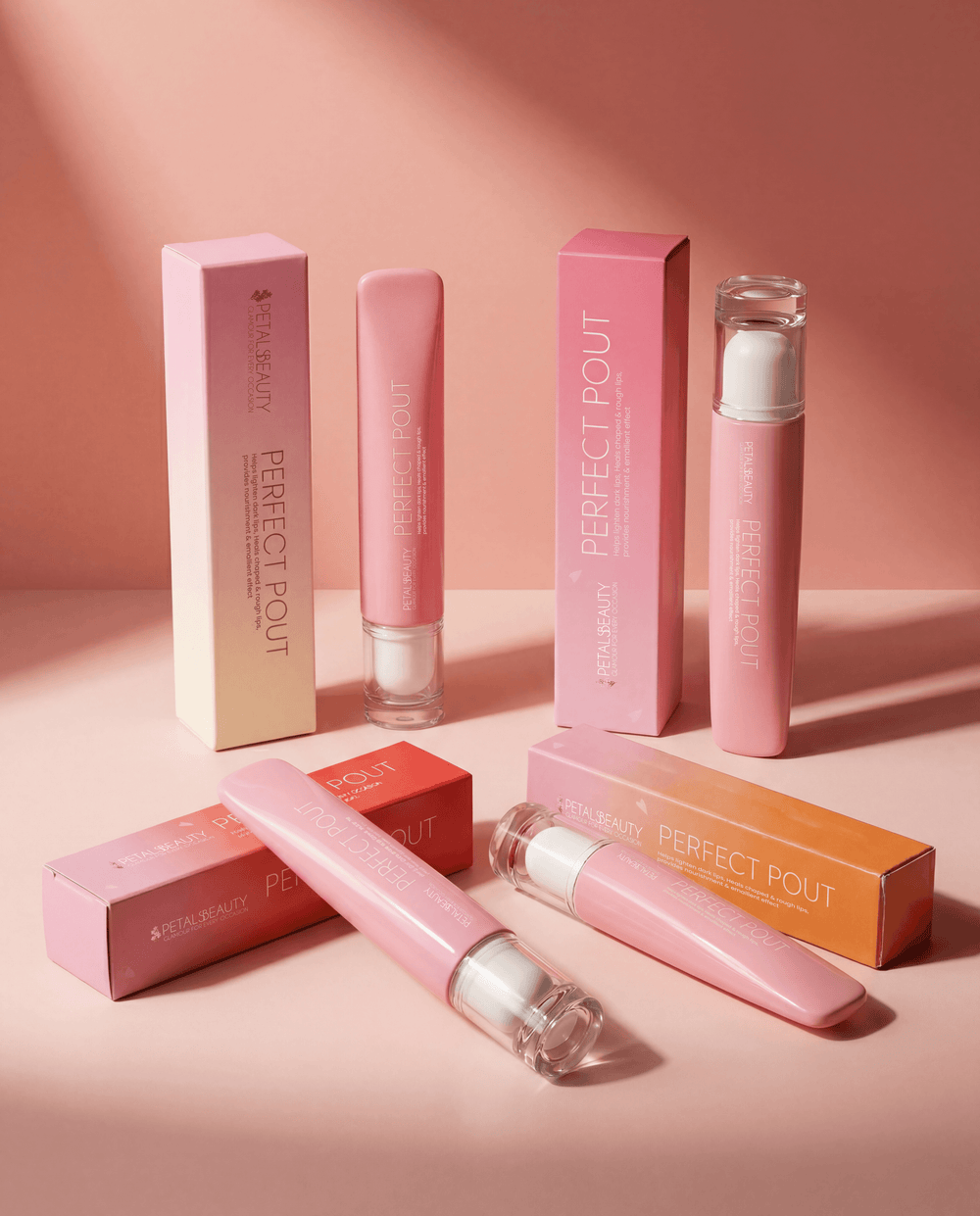 Perfect Pout lip gloss bundle with all four tubes laid out