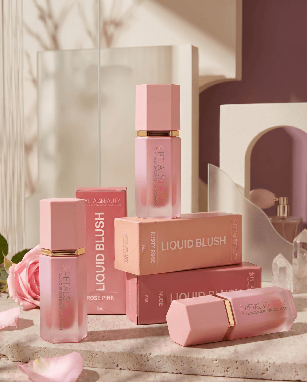 Three liquid blushes in Rusty Rose, Nude and Rose Pink shown together