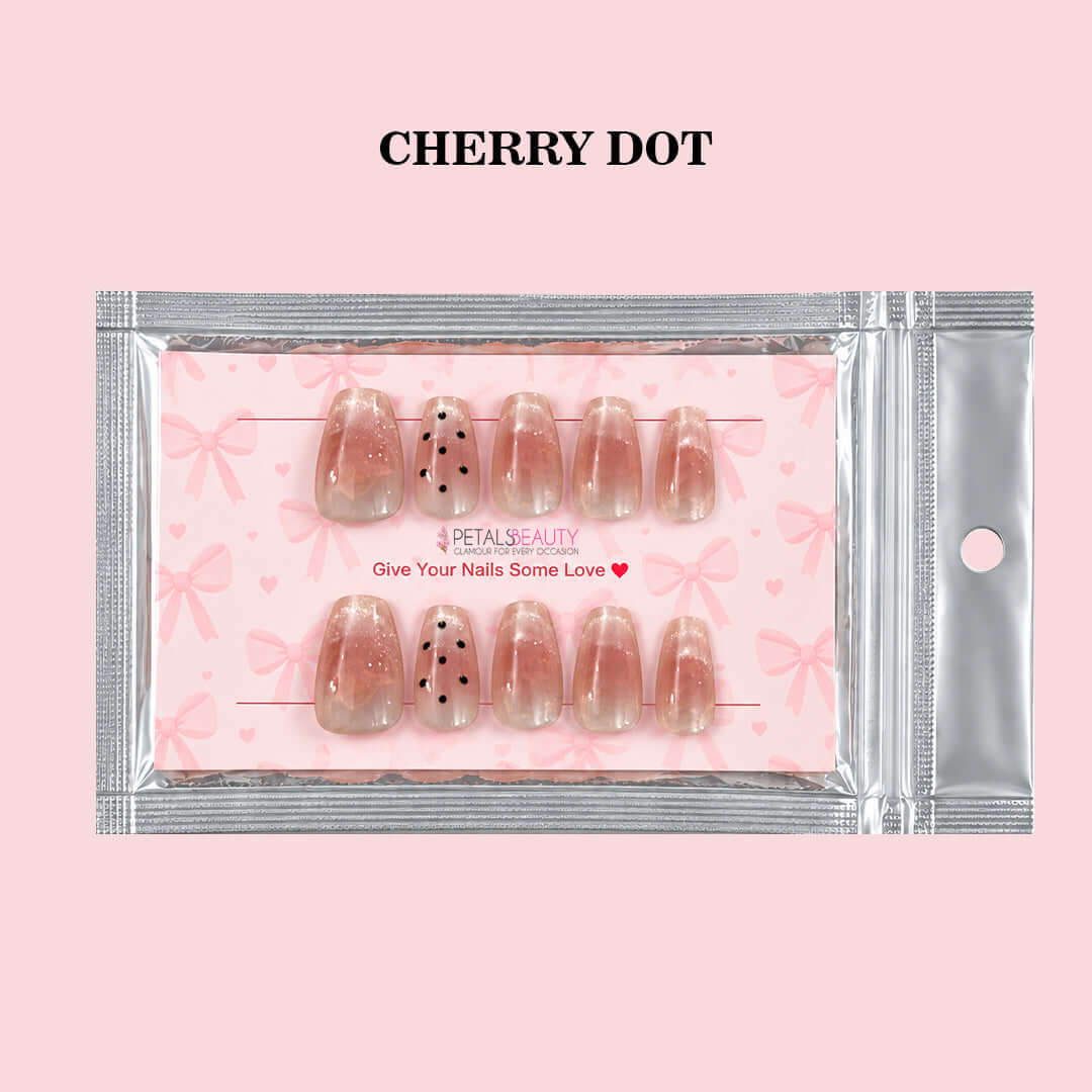 Petals Beauty press-on nails in Cherry Dot design