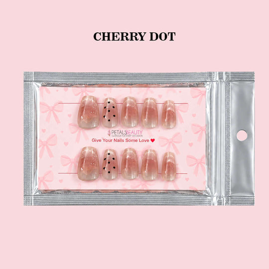 Petals Beauty press-on nails in Cherry Dot design